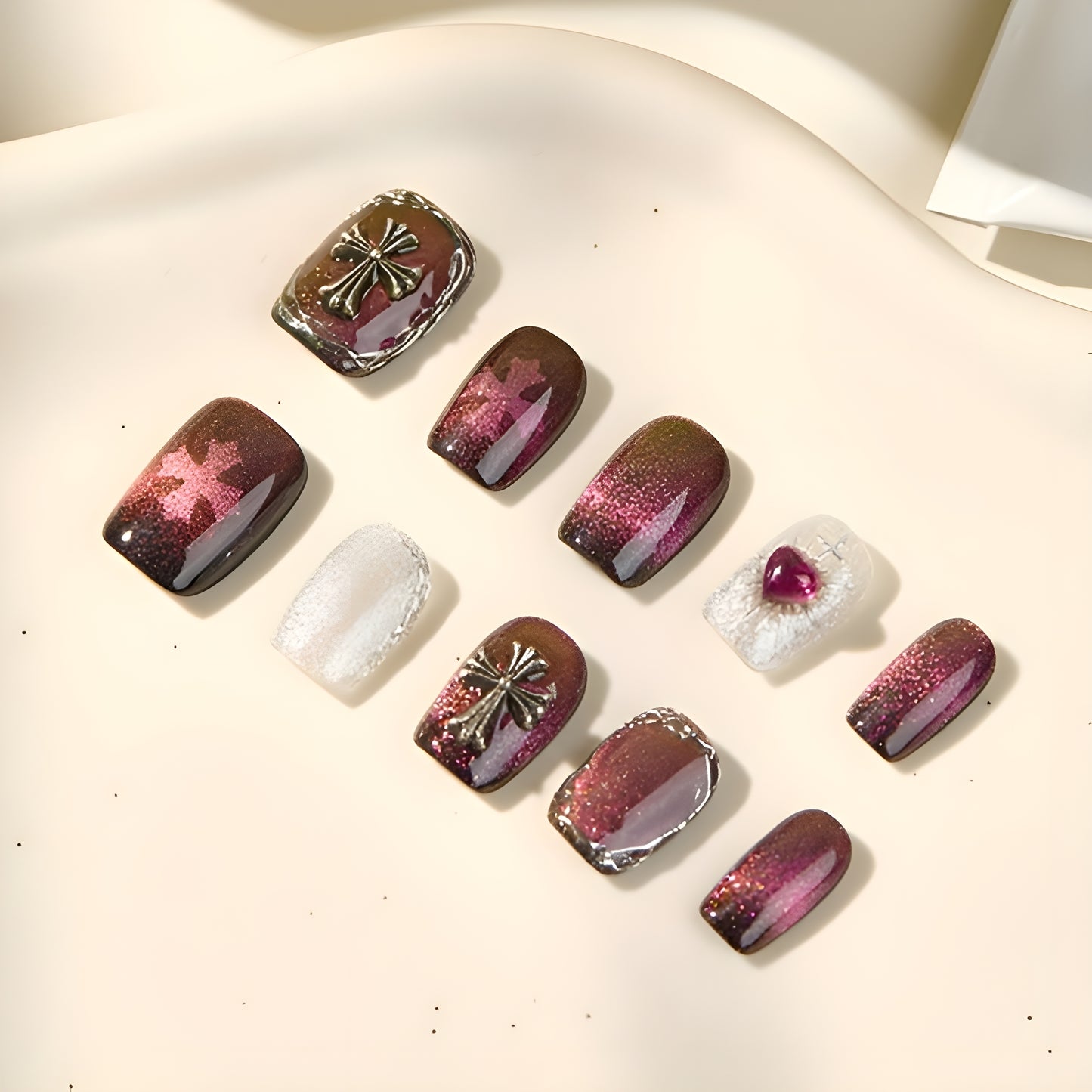 Silver glitter nail with purple gem heart detail from Garnet Eclipse set