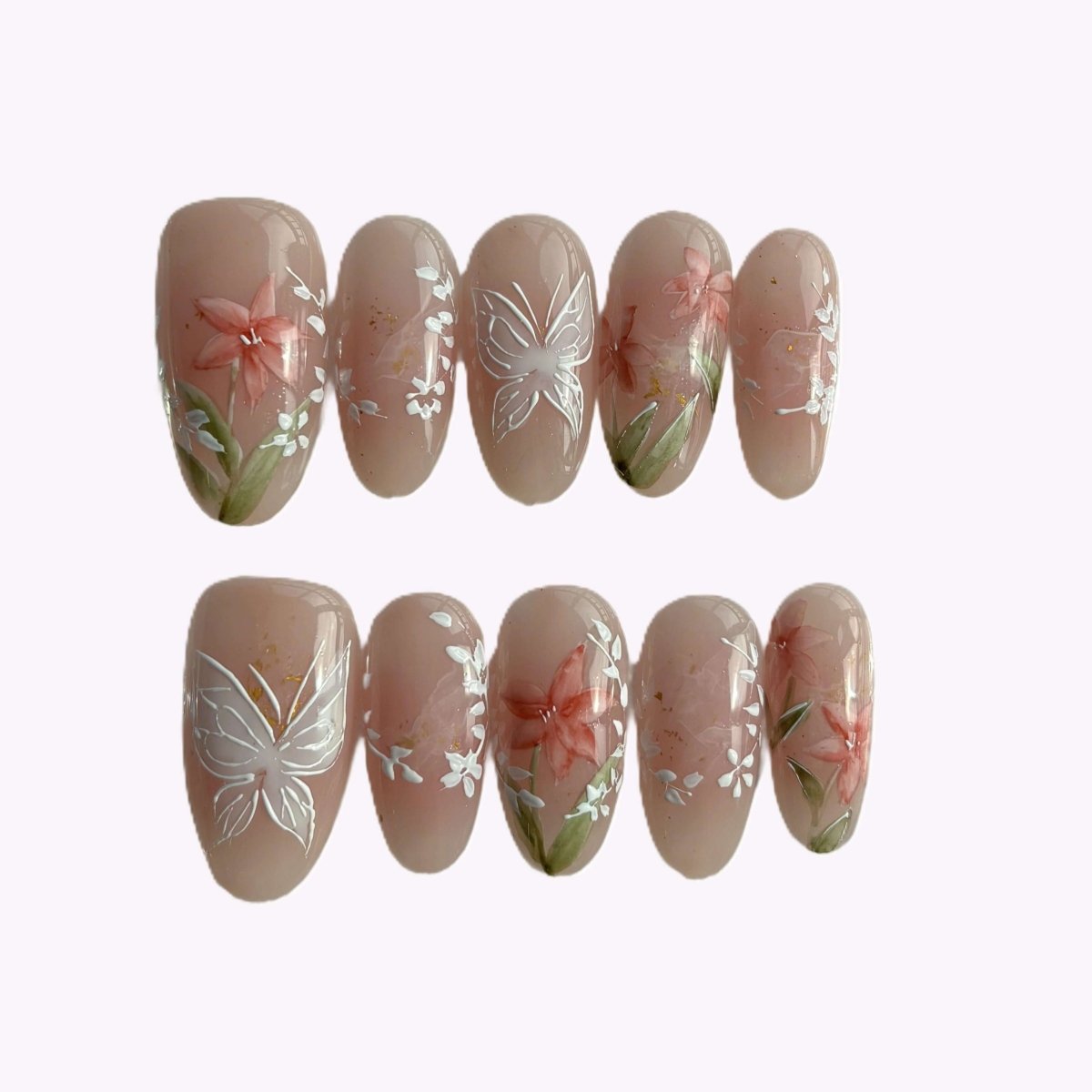 Hand-painted blush pink floral press on nails with white butterfly accents