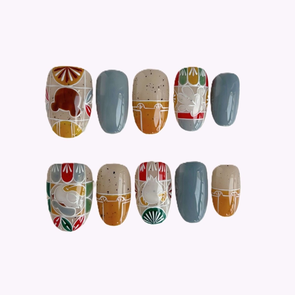 Handmade Forest Folk short oval press-on nail set with bear, bunny, and folk-art floral designs