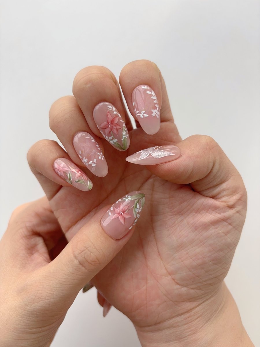 Glossy handmade butterfly nail art set with translucent nude base