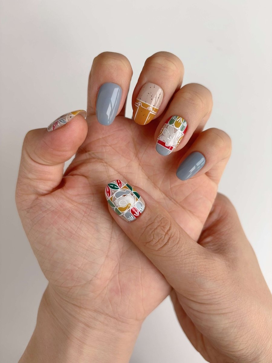 Bear and bunny art press-on nails in cozy woodland color palette with glossy gel finish