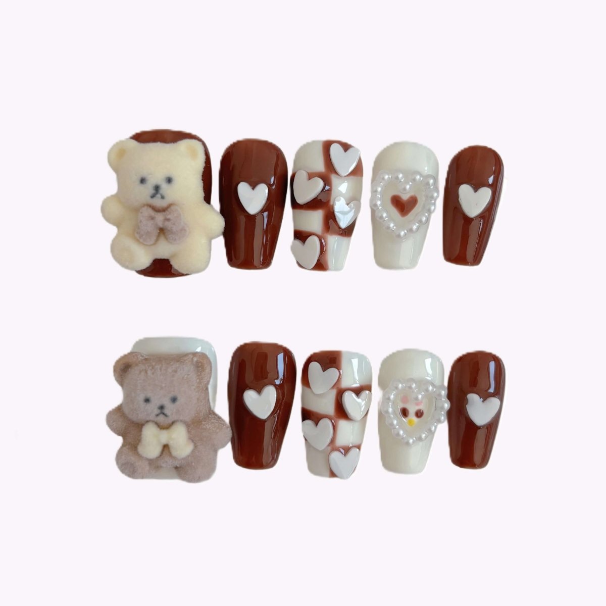 Cocoa Bear Blush handmade press-on nails with 3D teddy and heart accents in case