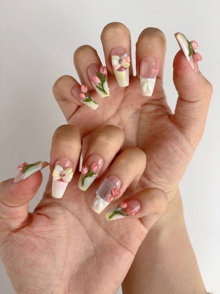 Handcrafted floral press-on nails with pastel ombré and sculpted roses