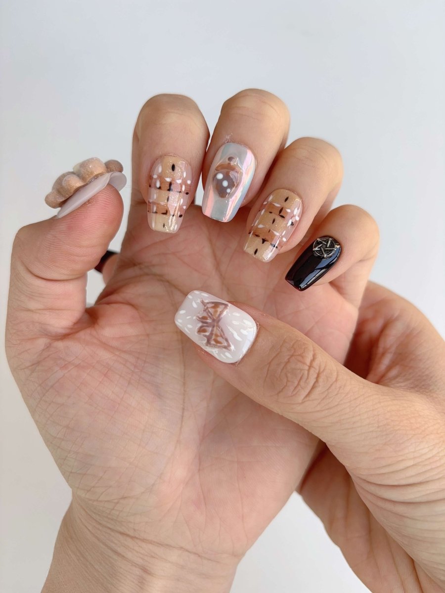 Full hand wearing soft brown plaid and dessert-themed kawaii press-on nails