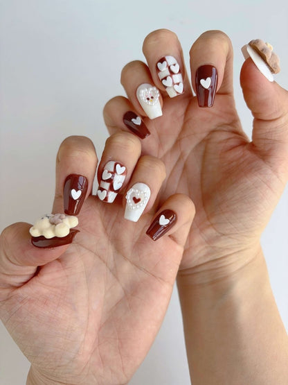 Full hand view of Cocoa Bear Blush press-on nails with romantic kawaii details