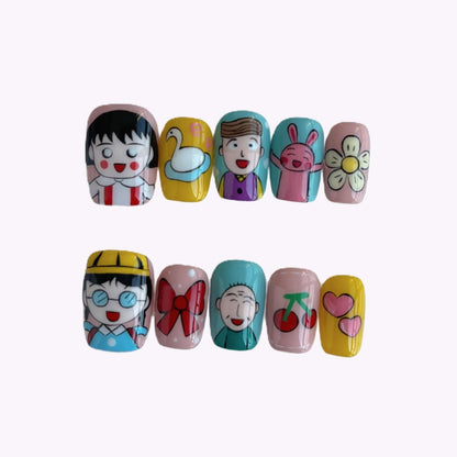 Hand-painted kawaii cartoon press-on nails featuring smiling characters, cherries, and hearts on pastel backgrounds