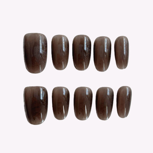 Short brown cat eye press-on nails in magnetic gel finish